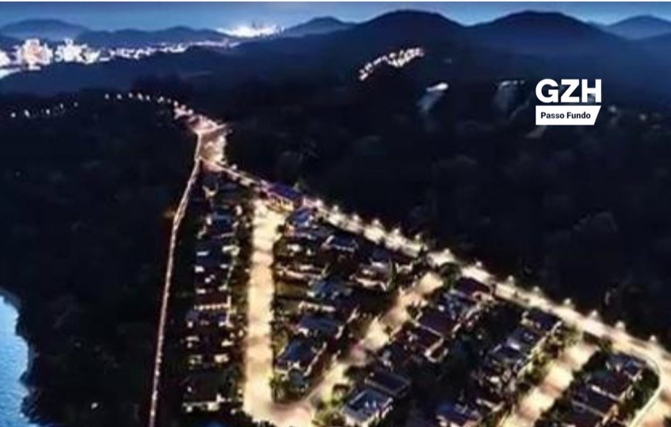 Perspectiva ilustrativa do condomínio iluminado à noite, exibida na reportagem da GZH Passo Fundo